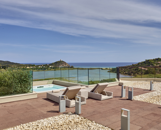 Outdoor area with private whirlpool and view of ocean